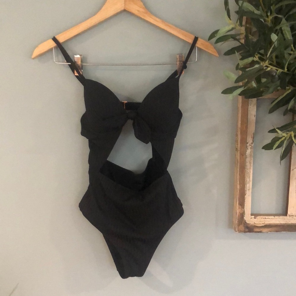 Woman’s 32B black one piece swimsuit